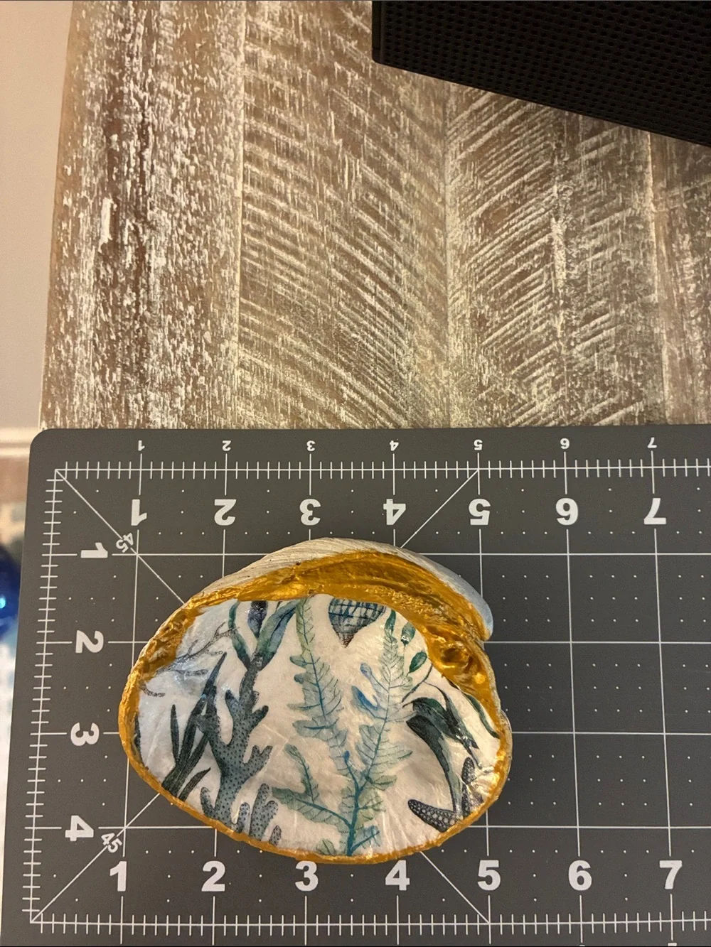 Decorative Gold-Rimmed Shell Accent Bowl with Blue Seaweed Print